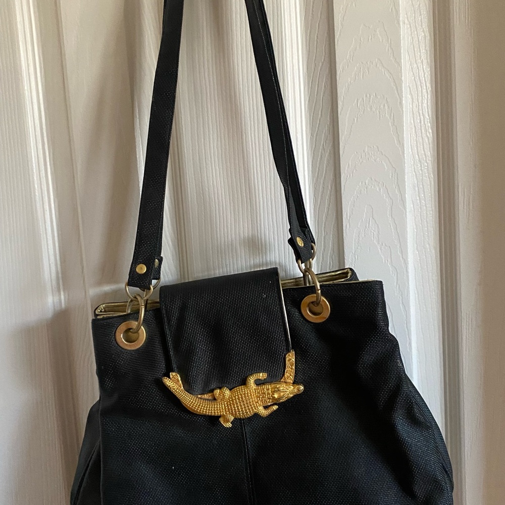 Elegant Black Handbag with Gold Accent
